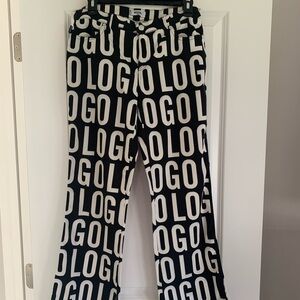 Women's Vintage 90s Moschino Jeans
Black White Logo Print Pants.